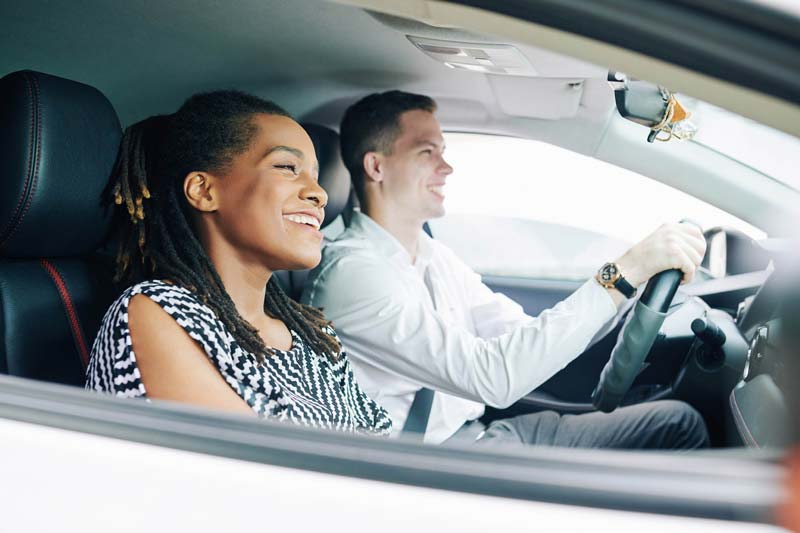 multiethnic-couple-driving-2021-08-26-19-52-26-utc